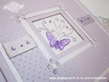 svijetlo ljubičast foto album s lila leptirom i točkicama